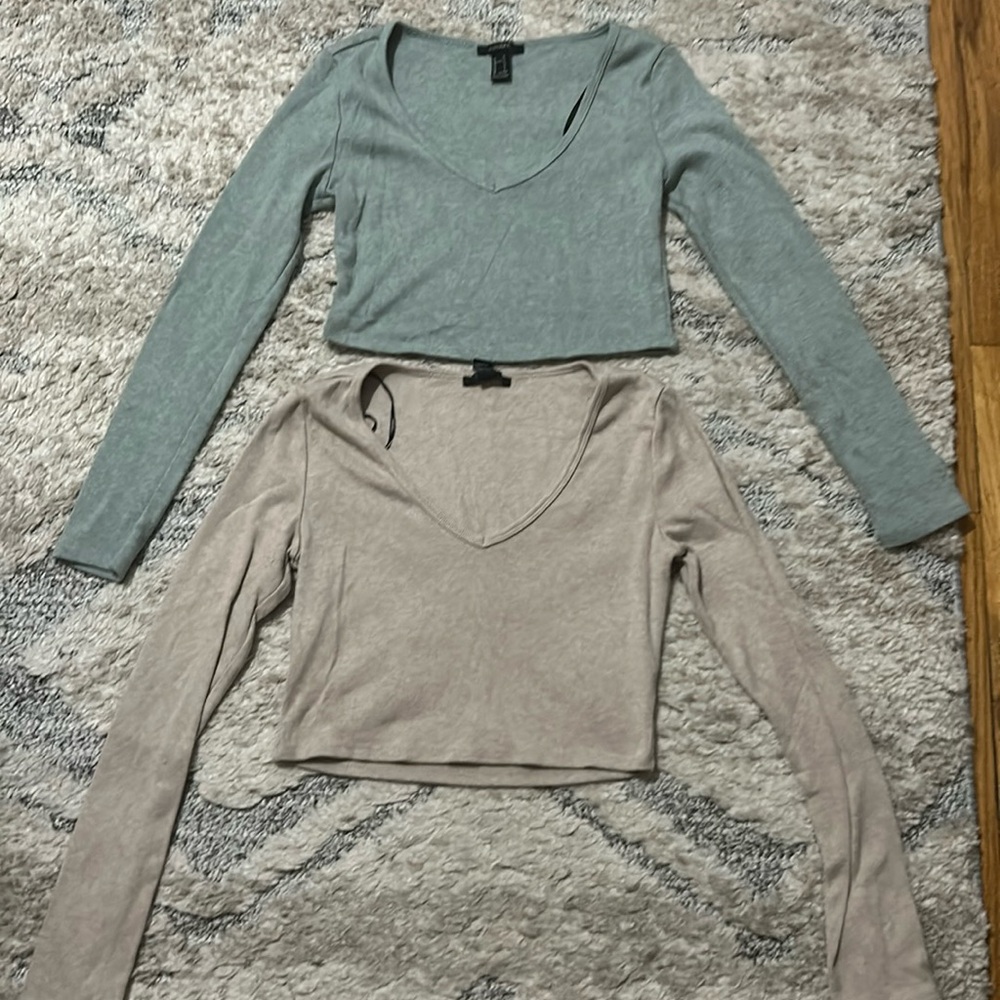 Size size but stretchy, one beige color and another a green/teal color.